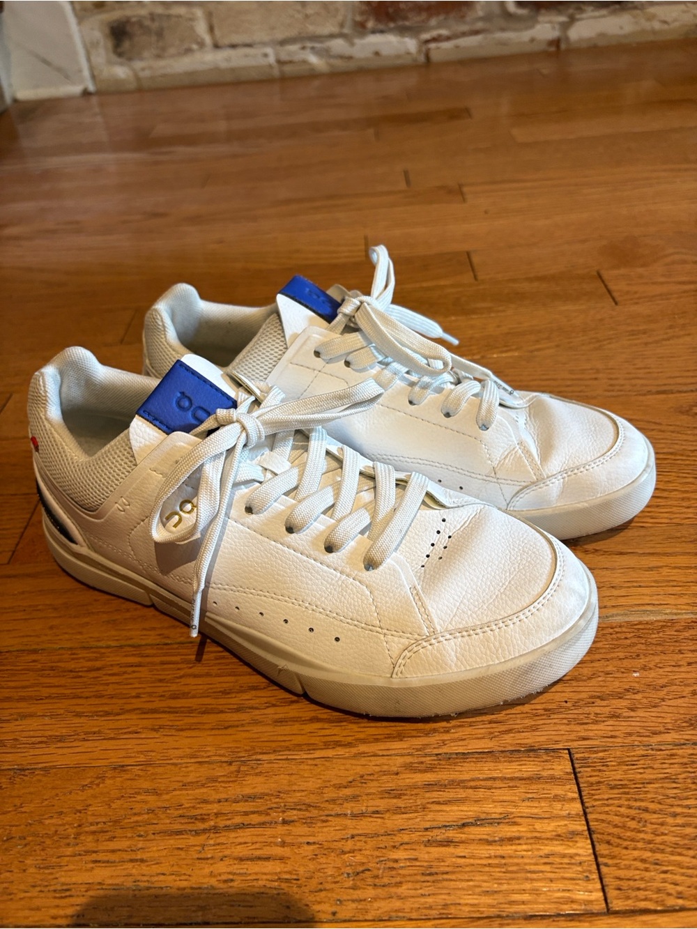 White Low-Top Leather Sneakers with Blue Accent